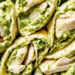 **Healthy Pesto Chicken Salad with Rotisserie Chicken** Hey there, friends! I just made this **Healthy Pesto Chicken Salad** and I had to share it with you all because it's such a game-changer. It’s fresh, delicious, and perfect for a quick lunch or light dinner. Plus, it’s made using rotisserie chicken, so it’s super convenient. If you’re someone who loves flavorful, easy-to-make salads, you’re going to love this one! ### Why You’ll Love This Recipe? This salad has everything you need – tender, juicy chicken, the perfect amount of basil pesto for that fresh kick, and a blend of crunchy veggies. It’s packed with protein, low on carbs, and has that perfect balance of flavors to keep you coming back for more. Plus, it's incredibly quick to whip up, especially with the rotisserie chicken doing most of the work. Trust me, you won’t be disappointed! ### Ingredients You'll find the full list of ingredients below, but here’s a sneak peek at what you’ll need: - Rotisserie chicken (shredded) - Fresh basil pesto - Cherry tomatoes - Cucumbers - Red onion - Fresh arugula or mixed greens - Feta cheese (optional) - Pine nuts or sunflower seeds for a crunchy topping Now, keep reading for the full ingredient list below! ### Directions #### Step 1: Shred the Chicken Start by shredding the rotisserie chicken. You’ll need about 2 cups of chicken, but feel free to adjust based on how much salad you want to make. If you're using leftover chicken, even better! This is a great way to repurpose your leftovers into something new. #### Step 2: Prepare the Veggies While the chicken is cooling down, grab your cherry tomatoes, cucumbers, and red onion. Slice the tomatoes and cucumbers into bite-sized pieces. For the red onion, I love to slice it thinly to avoid any overpowering flavor, but it’s totally up to you. Set these aside for now. #### Step 3: Mix the Salad Base In a large salad bowl, toss together the shredded chicken, fresh arugula (or mixed greens), and the veggies you’ve prepared. Make sure it’s all evenly mixed so you get a nice bite of everything in every forkful. #### Step 4: Add the Pesto Now, grab that delicious basil pesto! Add about 3–4 tablespoons to your chicken and veggie mixture. Stir everything together until the pesto coats all the ingredients. You can always add more pesto to taste. If you like a creamier consistency, feel free to add a bit of olive oil or a spoonful of Greek yogurt to make it richer. #### Step 5: Add Some Crunch and Creaminess This step is optional, but I like to sprinkle a handful of pine nuts or sunflower seeds for an extra crunch. You can also add crumbled feta cheese if you’re in the mood for some creaminess. #### Step 6: Serve Once everything is mixed, give it a final taste test. If it needs a little more salt, pepper, or pesto, go ahead and adjust. Serve immediately, and enjoy the fresh, flavorful goodness! ### Expert Tips and Tricks - **Rotisserie Chicken**: If you don’t have rotisserie chicken, you can easily substitute with any leftover cooked chicken or even grilled chicken breasts. Just make sure it’s shredded for the best texture. - **Pesto**: Homemade pesto is always a winner, but store-bought pesto is perfect if you need something quick. Just make sure to choose a good-quality pesto to really elevate the flavor. - **Veggie Variations**: Feel free to swap out the veggies depending on what you have on hand. Zucchini, bell peppers, or even avocado would all be delicious additions to this salad. ### Recipe Variations and Possible Substitutions - **Dairy-Free Version**: Skip the feta cheese or use a dairy-free alternative to keep this salad dairy-free. - **Nuts and Seeds**: If you have a nut allergy, you can leave out the pine nuts and substitute them with sunflower seeds or even crispy chickpeas for crunch. - **Low-Carb Version**: Skip the arugula and serve this as a chicken pesto bowl over cauliflower rice for a low-carb meal. - **Herb Substitutes**: No basil? No problem! You can swap in spinach, kale, or even arugula to create a unique twist. ### Serving and Pairing Suggestions This Healthy Pesto Chicken Salad is great on its own, but it can also be paired with: - A side of crispy roasted sweet potatoes - Fresh bread (or gluten-free bread) for a hearty meal - A light vinaigrette or lemon wedge for extra zing It’s the kind of salad that can easily be turned into a full meal or served as a refreshing side dish for any occasion. ### Storage and Reheating Tips If you have leftovers (lucky you!), you can store this salad in an airtight container in the fridge for 2–3 days. However, keep in mind that the arugula or greens may wilt after a day or so. For best results, store the pesto separately from the veggies and chicken if you want to keep everything fresh. Reheating the salad isn’t necessary since it’s a cold dish, but if you prefer it warm, you can microwave the chicken and pesto for 30–45 seconds before adding it to your salad. ### 4 FAQs #### 1. Can I use a different type of chicken? Absolutely! If you don’t have rotisserie chicken, you can use grilled chicken, leftover cooked chicken, or even poached chicken breasts. #### 2. Can I make this salad in advance? Yes, this salad is great for meal prep! Just keep the pesto separate from the salad base to avoid wilting, and toss everything together when you're ready to eat. #### 3. What kind of pesto should I use? You can use any kind of pesto you like—store-bought, homemade, or even a dairy-free version! The flavor of the pesto really makes this salad, so go with what you love. #### 4. Can I make this salad without greens? Definitely! You can skip the greens and make this more of a chicken and veggie bowl. Add more cucumber, tomatoes, or even roasted veggies instead! ### Conclusion This Healthy Pesto Chicken Salad with Rotisserie Chicken is the perfect combination of fresh ingredients, savory pesto, and tender chicken. It’s easy to make, customizable to your tastes, and can be enjoyed as a light meal or a hearty snack. Give it a try, and I promise it’ll become one of your go-to recipes for quick and healthy meals!