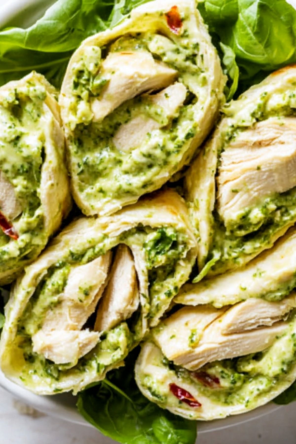 **Healthy Pesto Chicken Salad with Rotisserie Chicken** Hey there, friends! I just made this **Healthy Pesto Chicken Salad** and I had to share it with you all because it's such a game-changer. It’s fresh, delicious, and perfect for a quick lunch or light dinner. Plus, it’s made using rotisserie chicken, so it’s super convenient. If you’re someone who loves flavorful, easy-to-make salads, you’re going to love this one! ### Why You’ll Love This Recipe? This salad has everything you need – tender, juicy chicken, the perfect amount of basil pesto for that fresh kick, and a blend of crunchy veggies. It’s packed with protein, low on carbs, and has that perfect balance of flavors to keep you coming back for more. Plus, it's incredibly quick to whip up, especially with the rotisserie chicken doing most of the work. Trust me, you won’t be disappointed! ### Ingredients You'll find the full list of ingredients below, but here’s a sneak peek at what you’ll need: - Rotisserie chicken (shredded) - Fresh basil pesto - Cherry tomatoes - Cucumbers - Red onion - Fresh arugula or mixed greens - Feta cheese (optional) - Pine nuts or sunflower seeds for a crunchy topping Now, keep reading for the full ingredient list below! ### Directions #### Step 1: Shred the Chicken Start by shredding the rotisserie chicken. You’ll need about 2 cups of chicken, but feel free to adjust based on how much salad you want to make. If you're using leftover chicken, even better! This is a great way to repurpose your leftovers into something new. #### Step 2: Prepare the Veggies While the chicken is cooling down, grab your cherry tomatoes, cucumbers, and red onion. Slice the tomatoes and cucumbers into bite-sized pieces. For the red onion, I love to slice it thinly to avoid any overpowering flavor, but it’s totally up to you. Set these aside for now. #### Step 3: Mix the Salad Base In a large salad bowl, toss together the shredded chicken, fresh arugula (or mixed greens), and the veggies you’ve prepared. Make sure it’s all evenly mixed so you get a nice bite of everything in every forkful. #### Step 4: Add the Pesto Now, grab that delicious basil pesto! Add about 3–4 tablespoons to your chicken and veggie mixture. Stir everything together until the pesto coats all the ingredients. You can always add more pesto to taste. If you like a creamier consistency, feel free to add a bit of olive oil or a spoonful of Greek yogurt to make it richer. #### Step 5: Add Some Crunch and Creaminess This step is optional, but I like to sprinkle a handful of pine nuts or sunflower seeds for an extra crunch. You can also add crumbled feta cheese if you’re in the mood for some creaminess. #### Step 6: Serve Once everything is mixed, give it a final taste test. If it needs a little more salt, pepper, or pesto, go ahead and adjust. Serve immediately, and enjoy the fresh, flavorful goodness! ### Expert Tips and Tricks - **Rotisserie Chicken**: If you don’t have rotisserie chicken, you can easily substitute with any leftover cooked chicken or even grilled chicken breasts. Just make sure it’s shredded for the best texture. - **Pesto**: Homemade pesto is always a winner, but store-bought pesto is perfect if you need something quick. Just make sure to choose a good-quality pesto to really elevate the flavor. - **Veggie Variations**: Feel free to swap out the veggies depending on what you have on hand. Zucchini, bell peppers, or even avocado would all be delicious additions to this salad. ### Recipe Variations and Possible Substitutions - **Dairy-Free Version**: Skip the feta cheese or use a dairy-free alternative to keep this salad dairy-free. - **Nuts and Seeds**: If you have a nut allergy, you can leave out the pine nuts and substitute them with sunflower seeds or even crispy chickpeas for crunch. - **Low-Carb Version**: Skip the arugula and serve this as a chicken pesto bowl over cauliflower rice for a low-carb meal. - **Herb Substitutes**: No basil? No problem! You can swap in spinach, kale, or even arugula to create a unique twist. ### Serving and Pairing Suggestions This Healthy Pesto Chicken Salad is great on its own, but it can also be paired with: - A side of crispy roasted sweet potatoes - Fresh bread (or gluten-free bread) for a hearty meal - A light vinaigrette or lemon wedge for extra zing It’s the kind of salad that can easily be turned into a full meal or served as a refreshing side dish for any occasion. ### Storage and Reheating Tips If you have leftovers (lucky you!), you can store this salad in an airtight container in the fridge for 2–3 days. However, keep in mind that the arugula or greens may wilt after a day or so. For best results, store the pesto separately from the veggies and chicken if you want to keep everything fresh. Reheating the salad isn’t necessary since it’s a cold dish, but if you prefer it warm, you can microwave the chicken and pesto for 30–45 seconds before adding it to your salad. ### 4 FAQs #### 1. Can I use a different type of chicken? Absolutely! If you don’t have rotisserie chicken, you can use grilled chicken, leftover cooked chicken, or even poached chicken breasts. #### 2. Can I make this salad in advance? Yes, this salad is great for meal prep! Just keep the pesto separate from the salad base to avoid wilting, and toss everything together when you're ready to eat. #### 3. What kind of pesto should I use? You can use any kind of pesto you like—store-bought, homemade, or even a dairy-free version! The flavor of the pesto really makes this salad, so go with what you love. #### 4. Can I make this salad without greens? Definitely! You can skip the greens and make this more of a chicken and veggie bowl. Add more cucumber, tomatoes, or even roasted veggies instead! ### Conclusion This Healthy Pesto Chicken Salad with Rotisserie Chicken is the perfect combination of fresh ingredients, savory pesto, and tender chicken. It’s easy to make, customizable to your tastes, and can be enjoyed as a light meal or a hearty snack. Give it a try, and I promise it’ll become one of your go-to recipes for quick and healthy meals!