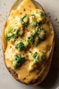 Cheesy Baked Potatoes with Broccoli Cheese Sauce: A Comfort Food Dream